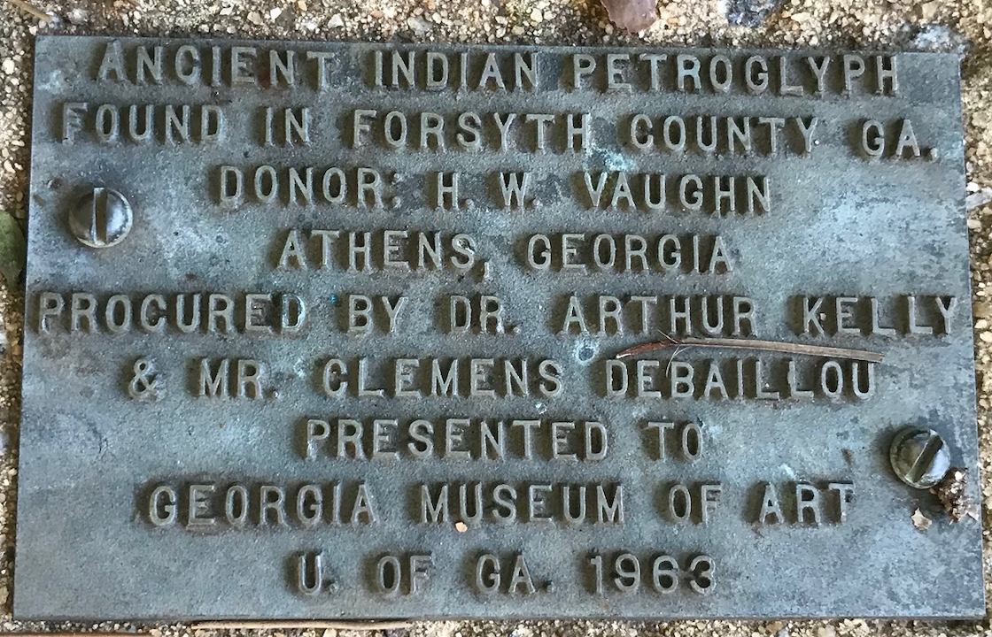 Plaque found describing Petroglyphic Boulders at Baldwin Hall site